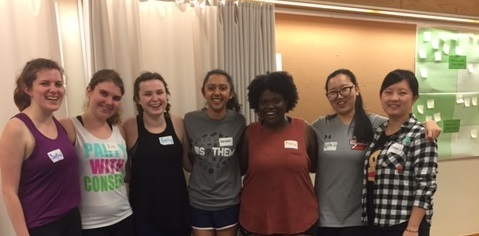 Young women smiling together during a self-defense cohort training